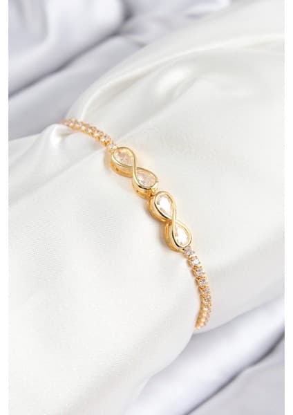 Pirinç Zirkon Taşlı Sonsuzluk Model Gold Renk Asansörlü Kadın